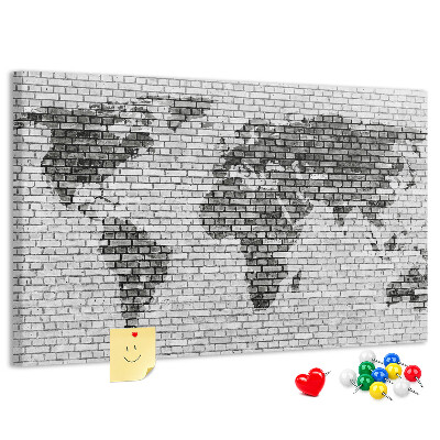 Pizarra de corcho Mapa del mundo en una pared de ladrillos