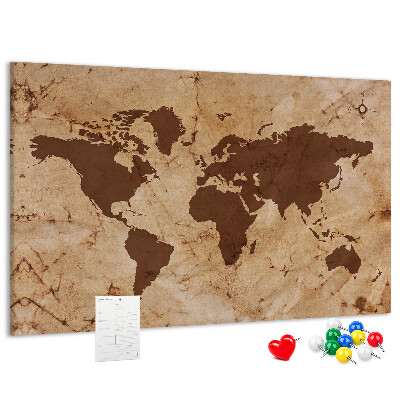 Pizarra de corcho con mapa del mundo antiguo sobre fondo marrón