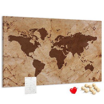 Pizarra de corcho con mapa del mundo antiguo sobre fondo marrón