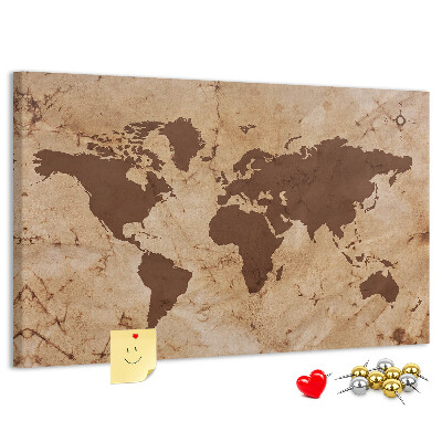 Pizarra de corcho con mapa del mundo antiguo sobre fondo marrón