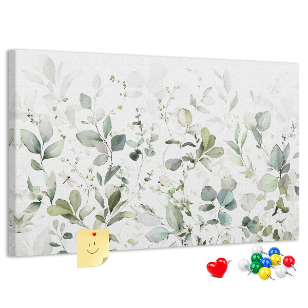 Tablero de corcho decorado con diseño de hojas delicadas en tonos apagados