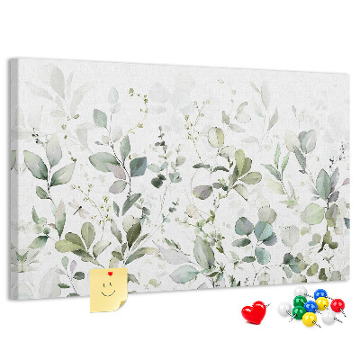 Tablero de corcho decorado con diseño de hojas delicadas en tonos apagados