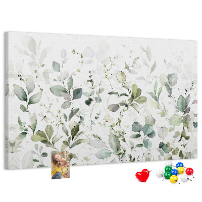 Tablero de corcho decorado con diseño de hojas delicadas en tonos apagados