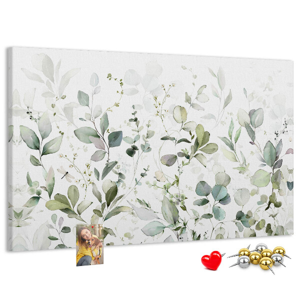 Tablero de corcho decorado con diseño de hojas delicadas en tonos apagados