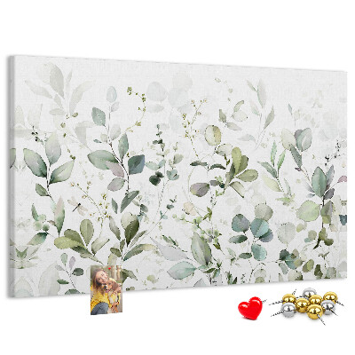 Tablero de corcho decorado con diseño de hojas delicadas en tonos apagados