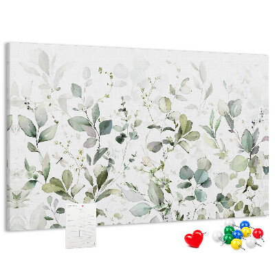 Tablero de corcho decorado con diseño de hojas delicadas en tonos apagados