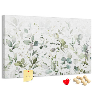 Tablero de corcho decorado con diseño de hojas delicadas en tonos apagados