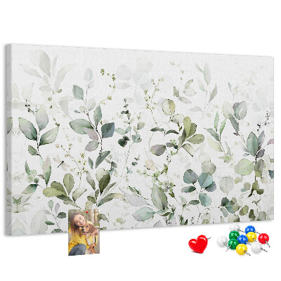 Tablero de corcho decorado con diseño de hojas delicadas en tonos apagados