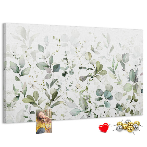 Tablero de corcho decorado con diseño de hojas delicadas en tonos apagados