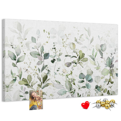 Tablero de corcho decorado con diseño de hojas delicadas en tonos apagados