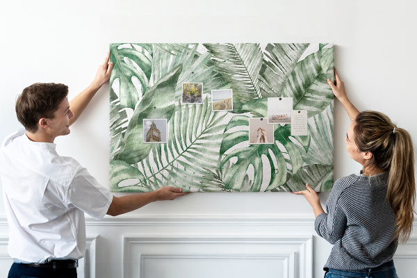 Pizarra de corcho con diseño de hojas tropicales en tonos verdes