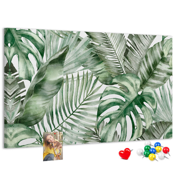 Pizarra de corcho con diseño de hojas tropicales en tonos verdes