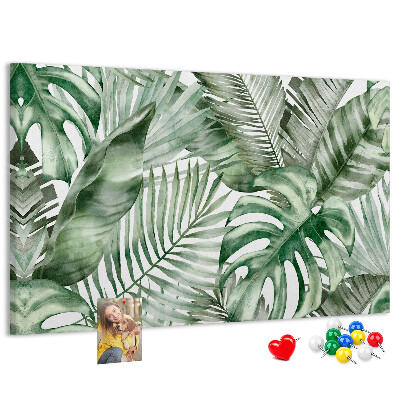 Pizarra de corcho con diseño de hojas tropicales en tonos verdes