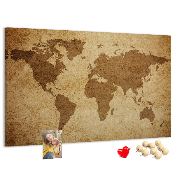 Tablero de corcho decorado mapa del mundo antiguo sobre fondo de bronce