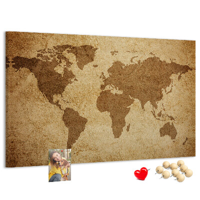 Tablero de corcho decorado mapa del mundo antiguo sobre fondo de bronce