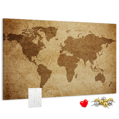 Tablero de corcho decorado mapa del mundo antiguo sobre fondo de bronce