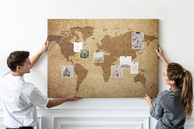 Tablero de corcho decorado mapa del mundo antiguo sobre fondo de bronce