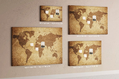 Tablero de corcho decorado mapa del mundo antiguo sobre fondo de bronce