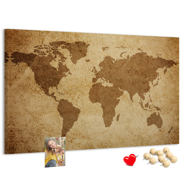 Tablero de corcho decorado mapa del mundo antiguo sobre fondo de bronce