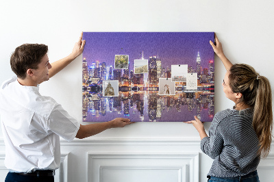 Tablero de corcho decorativo panorama nocturno de ciudad con reflejo en el agua