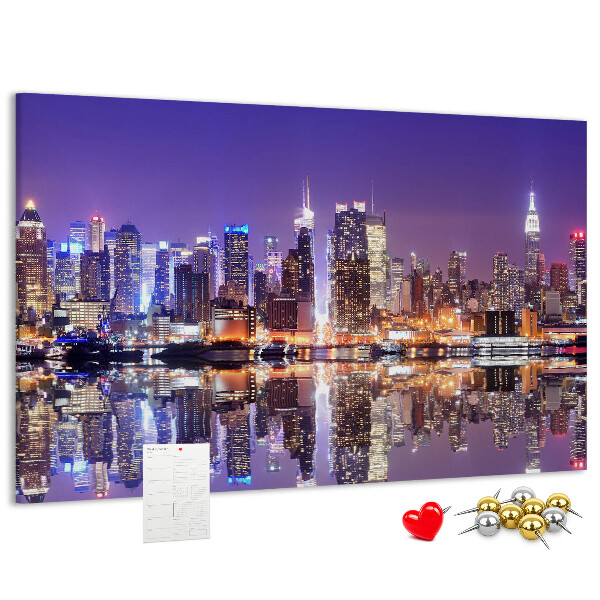 Tablero de corcho decorativo panorama nocturno de ciudad con reflejo en el agua