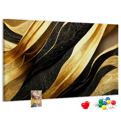 Tablero de anuncios con diseño de ondas de tela doradas y negras