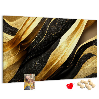 Tablero de anuncios con diseño de ondas de tela doradas y negras