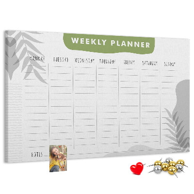 Pizarra de corcho con diseño de agenda semanal y motivos vegetales