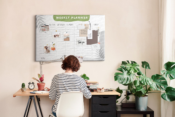 Pizarra de corcho con diseño de agenda semanal y motivos vegetales