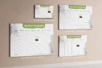 Pizarra de corcho con diseño de agenda semanal y motivos vegetales