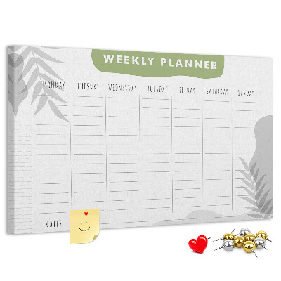 Pizarra de corcho con diseño de agenda semanal y motivos vegetales