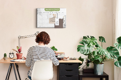 Pizarra de corcho con diseño de agenda semanal y motivos vegetales