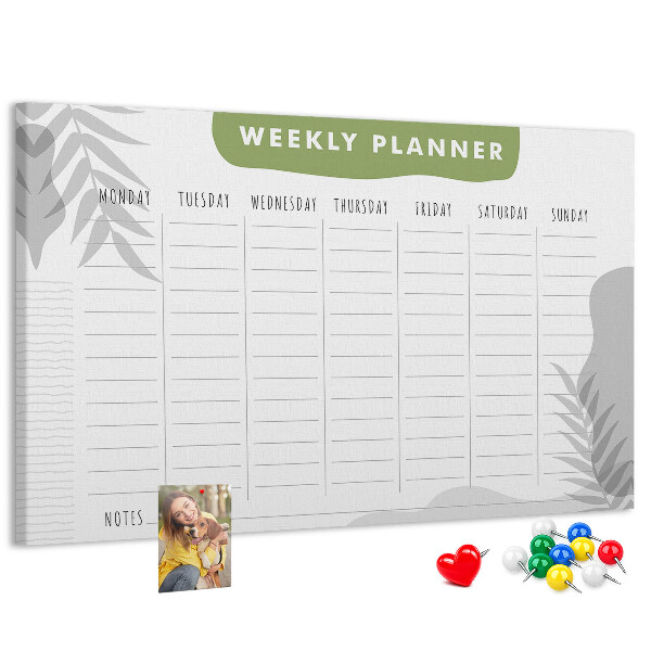 Pizarra de corcho con diseño de agenda semanal y motivos vegetales