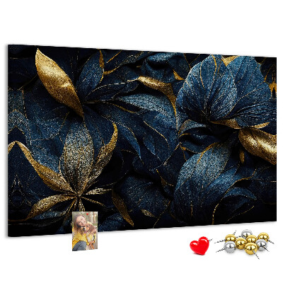 Tablero de corcho decorativo hojas doradas sobre un fondo azul oscuro