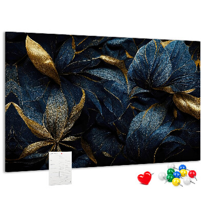 Tablero de corcho decorativo hojas doradas sobre un fondo azul oscuro