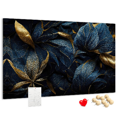 Tablero de corcho decorativo hojas doradas sobre un fondo azul oscuro