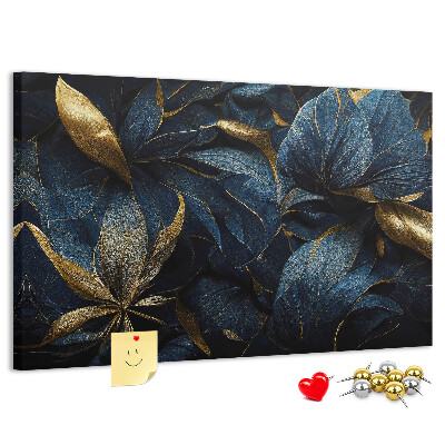 Tablero de corcho decorativo hojas doradas sobre un fondo azul oscuro