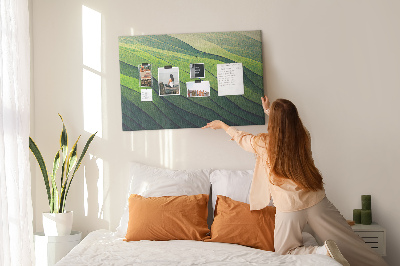 Tablero de anuncios con diseño de ondas verdes y textura de tierra