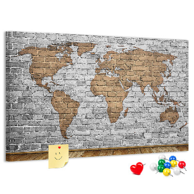Tablero de corcho decorado Mapa del mundo en una pared de ladrillos