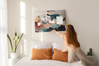 Tablero de corcho decorativo con diseño de nubes abstractas en colores apagados