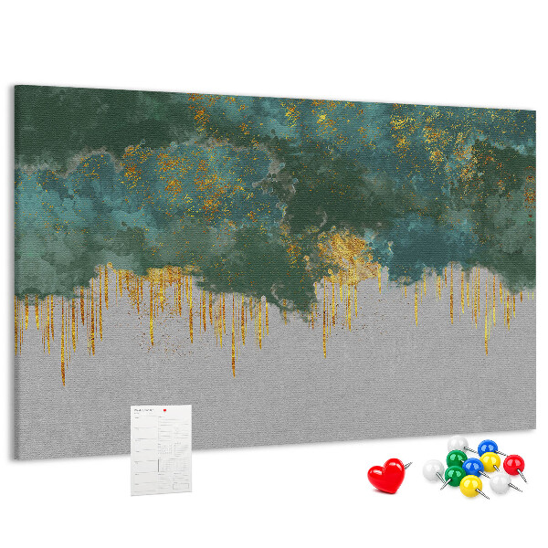 Pizarra de corcho con diseño de gotas doradas sobre fondo de nubes azules