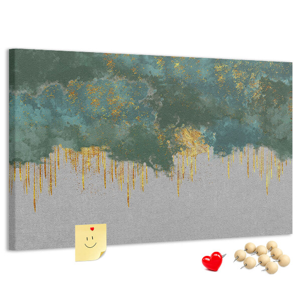 Pizarra de corcho con diseño de gotas doradas sobre fondo de nubes azules