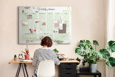 Agenda semanal de color verde con diseño de plantas