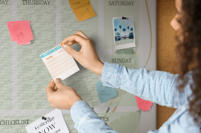 Agenda semanal de color verde con diseño de plantas