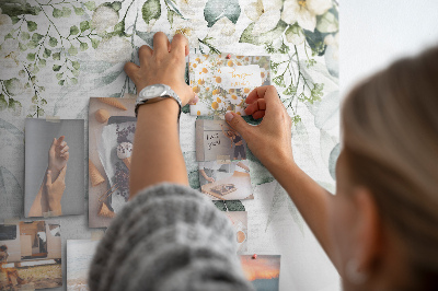Pizarra de corcho con diseños florales y de hojas en tonos pastel