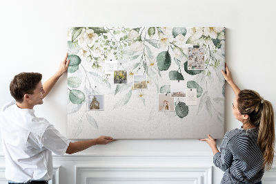Pizarra de corcho con diseños florales y de hojas en tonos pastel