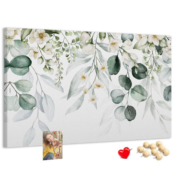 Pizarra de corcho con diseños florales y de hojas en tonos pastel