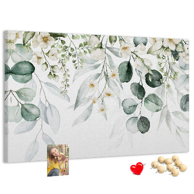 Pizarra de corcho con diseños florales y de hojas en tonos pastel