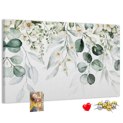 Pizarra de corcho con diseños florales y de hojas en tonos pastel