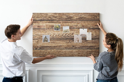 Tablero de anuncios de madera natural en tonos cálidos